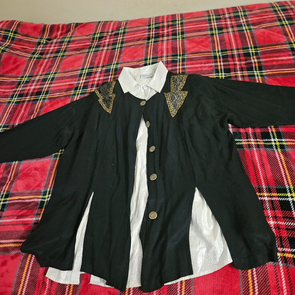 Black pantsuit with white blouse